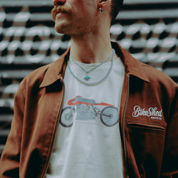 model wearing BSMC Guzzi Motorcycle ESTD. T-Shirt - Cream