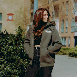 Model wearing Green Bike Shed Motorcycle Co. Good Times Hooded Sweatshirt