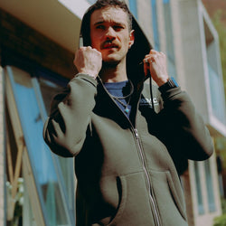 Model wearing Green Bike Shed Motorcycle Co. Good Times Hooded Sweatshirt