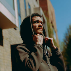 Model wearing Green Bike Shed Motorcycle Co. Good Times Hooded Sweatshirt