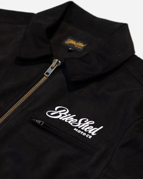 black twill motorcycle jacket with 'Bike Shed Moto Co' logo detail